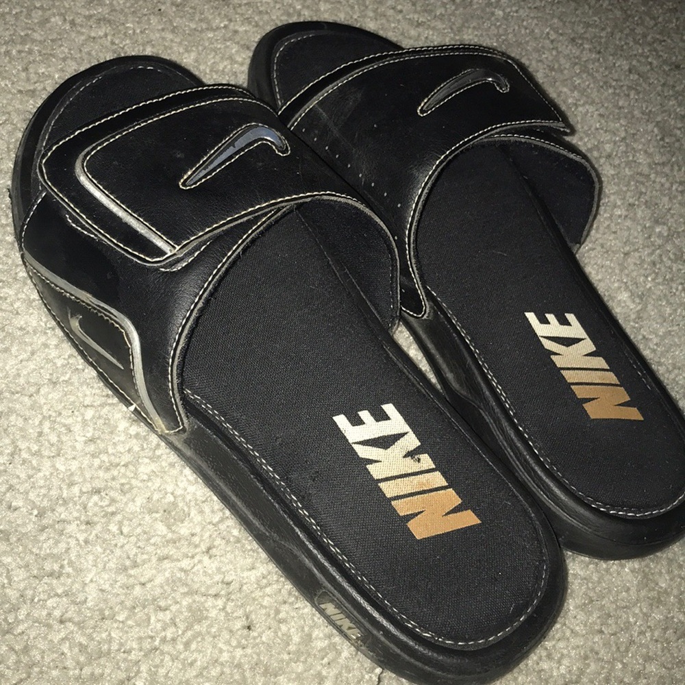 Woman’s Nike Slides Size 9